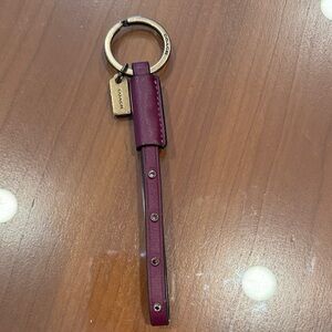 Coach Maroon Leather Keychain with Gold Details